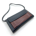 Cartera de piel para dama con asa azul marino